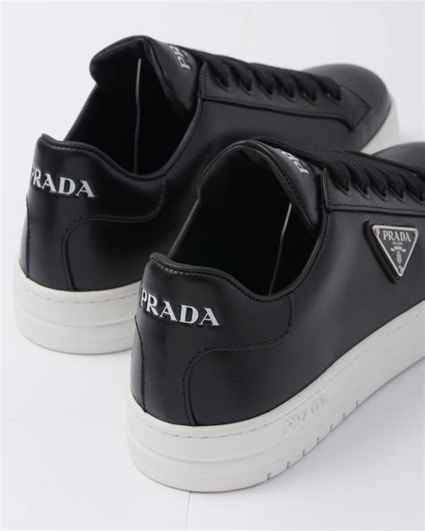 prada black and white trainers|all white prada shoes.